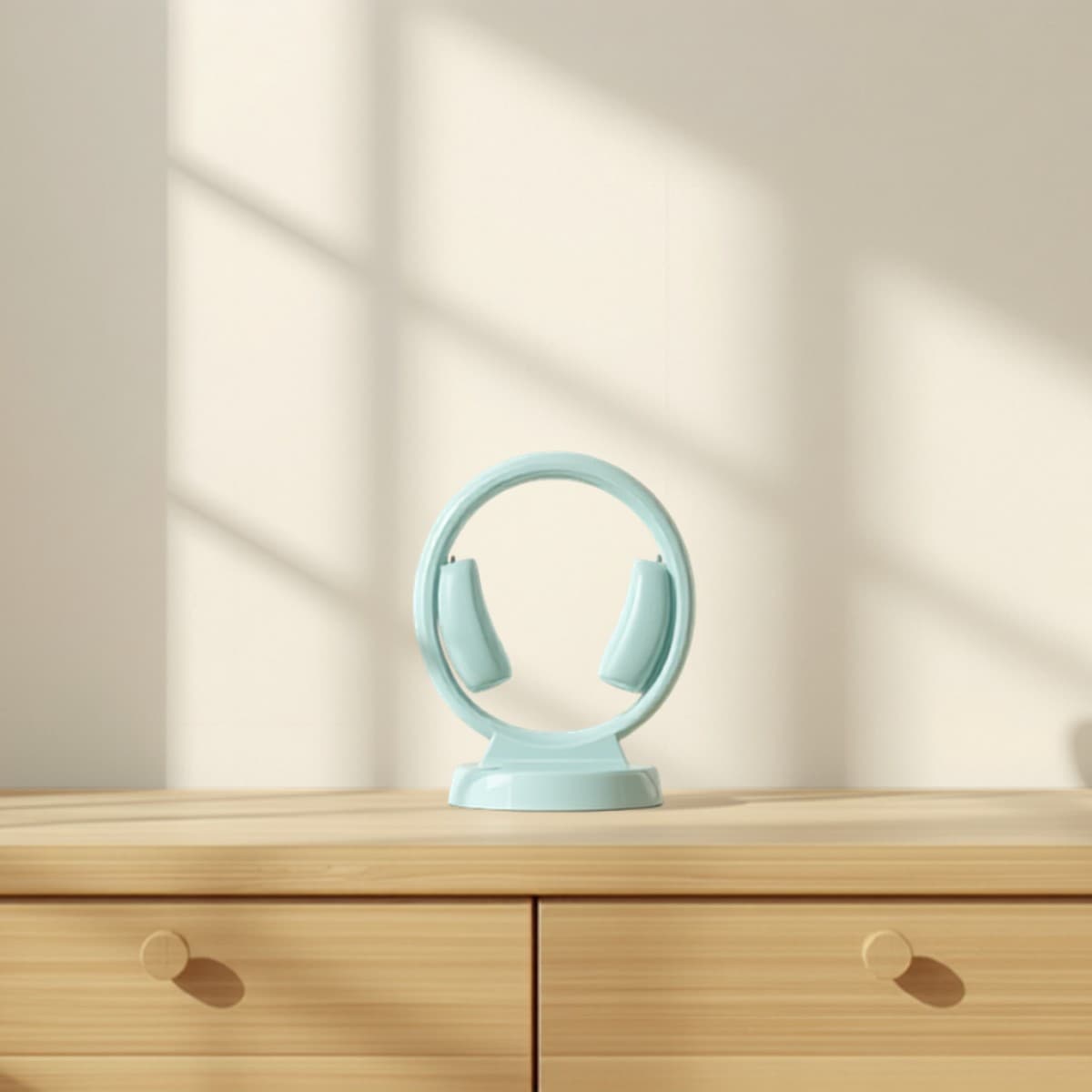 Enfile-bas de contention Aides Autonomie posé sur une commode en bois clair
